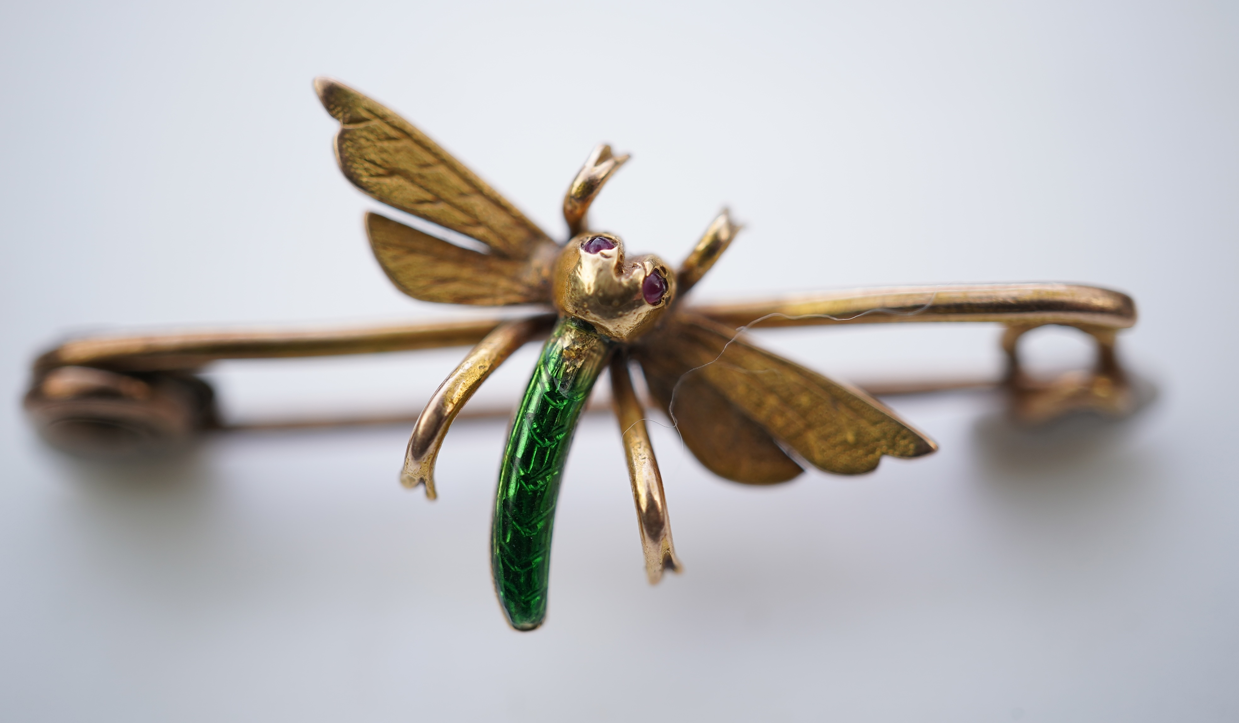 A gold and enamel brooch, early 20th century